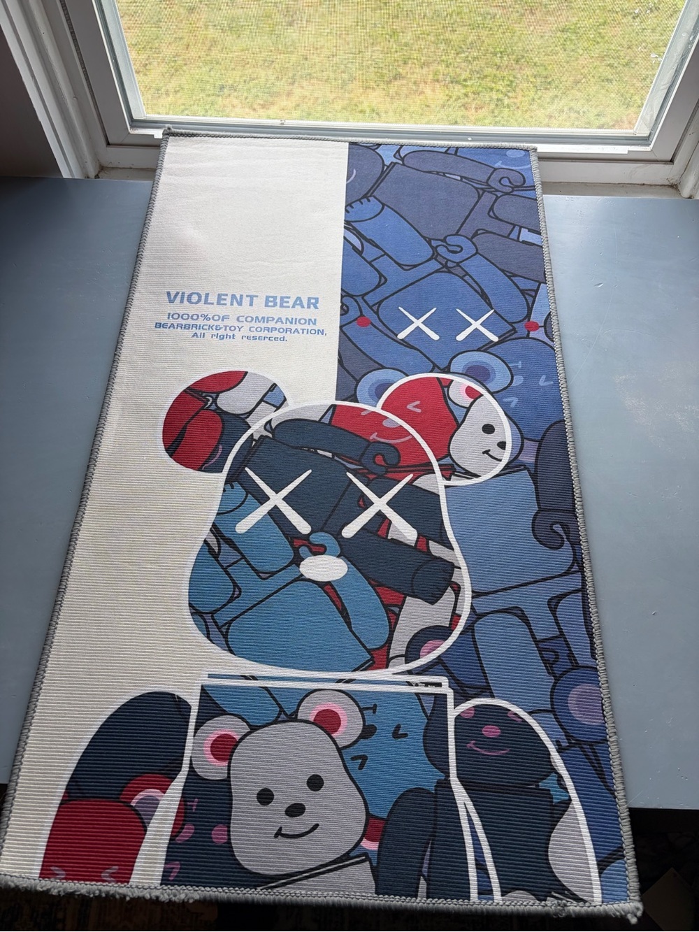 Violent Bear Blue Graphic Accent Rug by